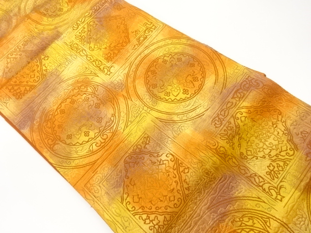 丸文に色紙・華紋模様織出し名古屋帯